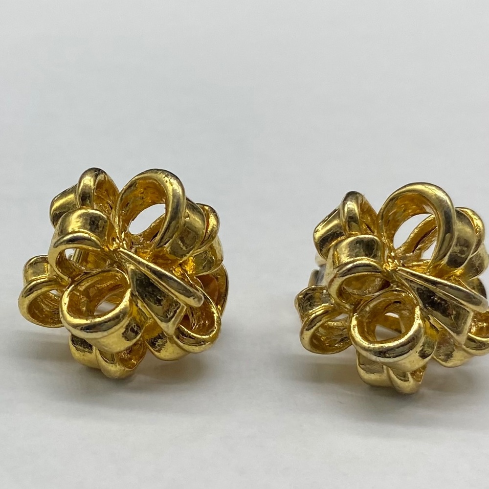 Gold clip on earrings